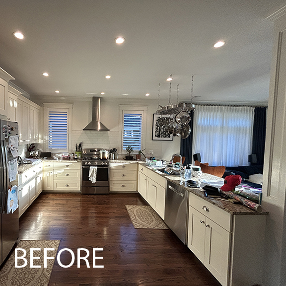 Before kitchen, white peninsula, stainless steel hood