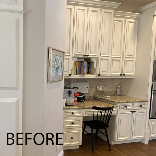 Before photo of white kitchen, built-in desk