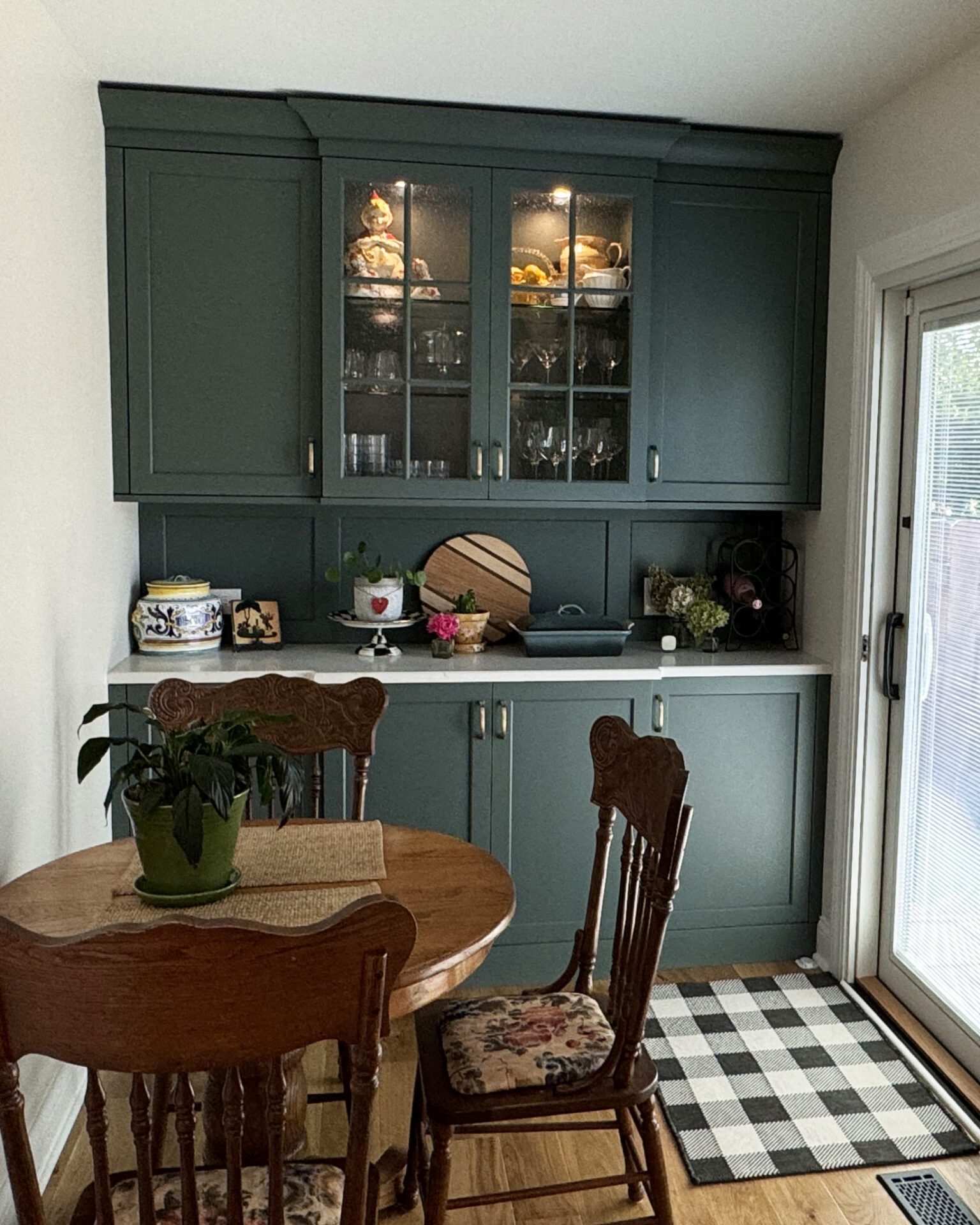 Rainforest green cabinet with glass panels