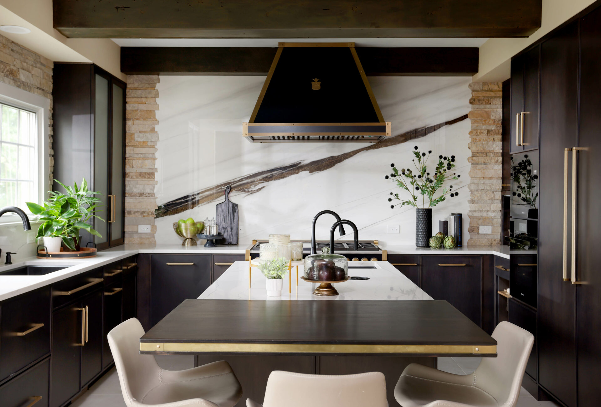 black kitchen with porcelain slab backsplash