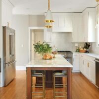 White kitchen with stained island