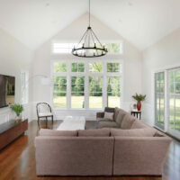 interior view of a family room addition with a vaulted ceiling