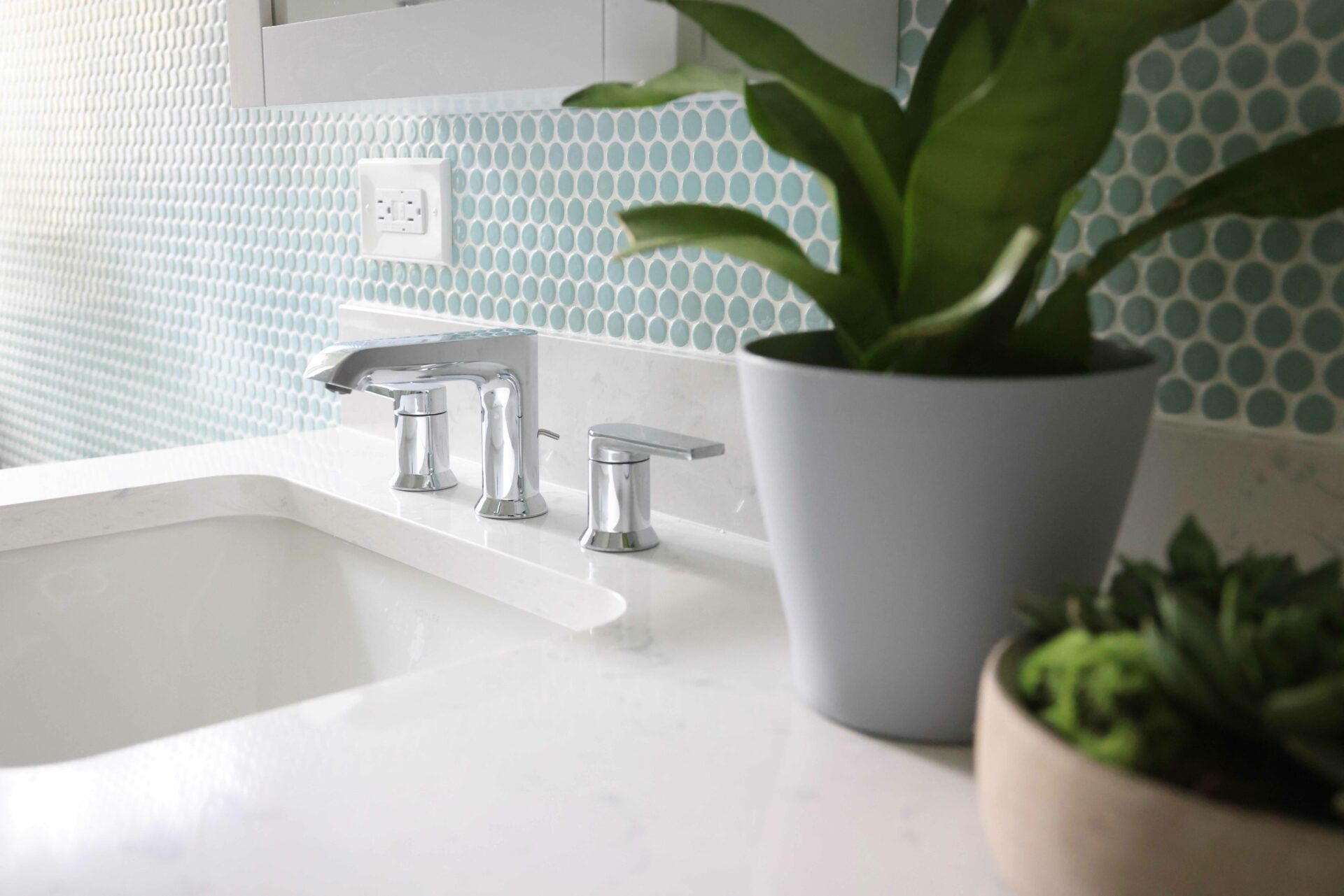 bathroom faucet with penny tile