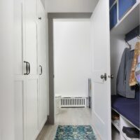 pantry pass through with bench leading to powder room