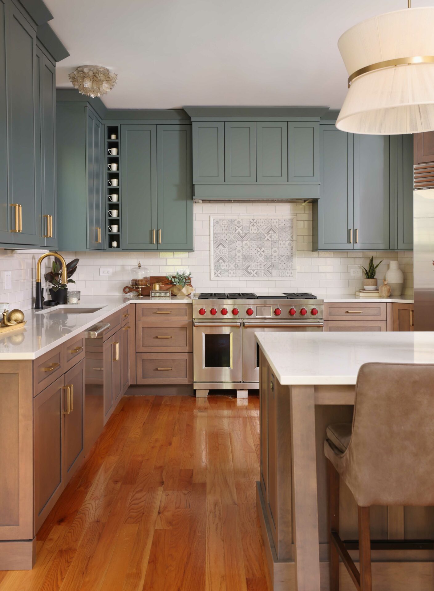 Blue green painted kitchen cabinets with medium stain maple cabinets