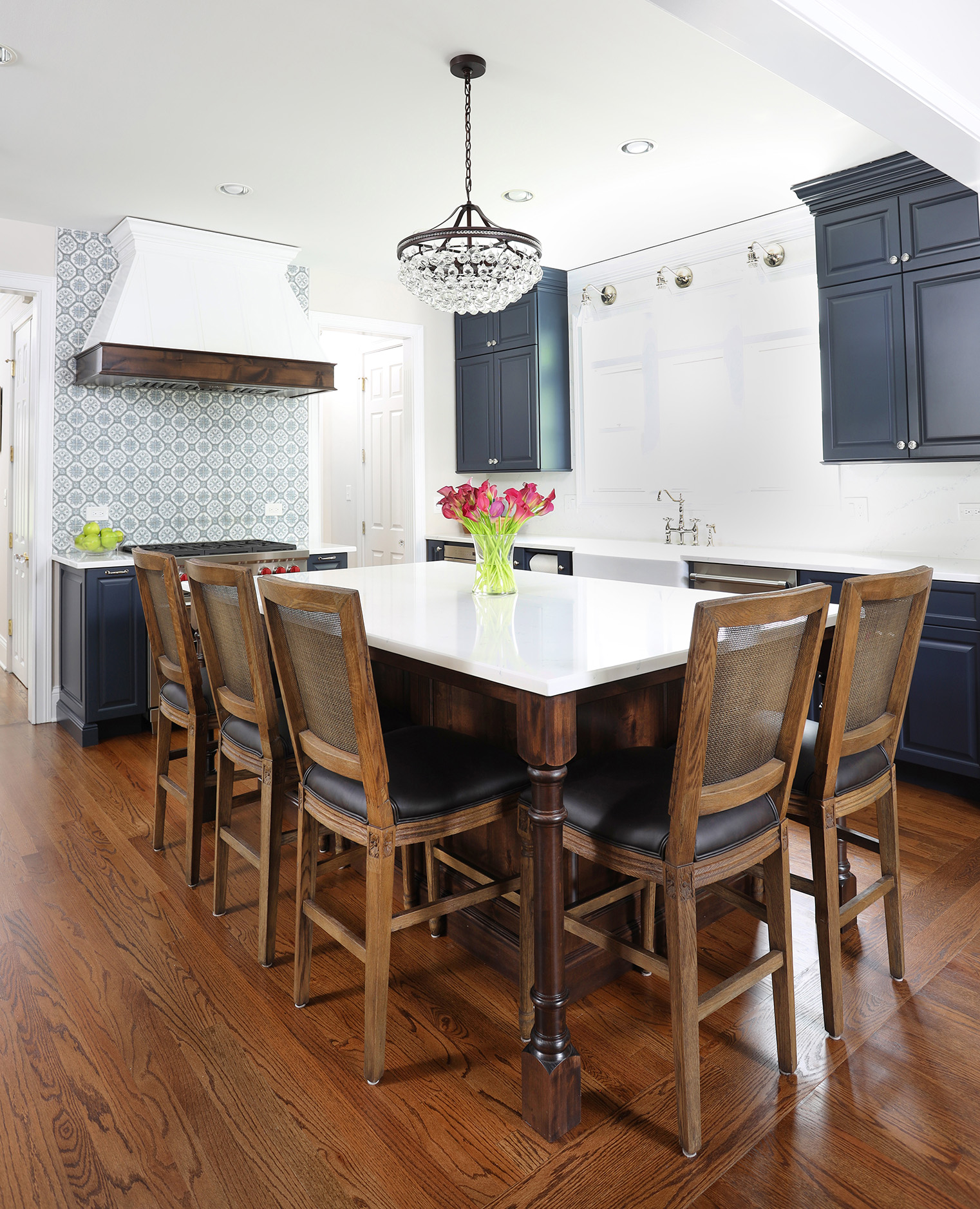 Stained alder island in a blue and white kitchen