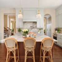 Soft blue updates the standard traditional kitchen aesthetic, keeping it fresh without resorting to a standard white kitchen palette