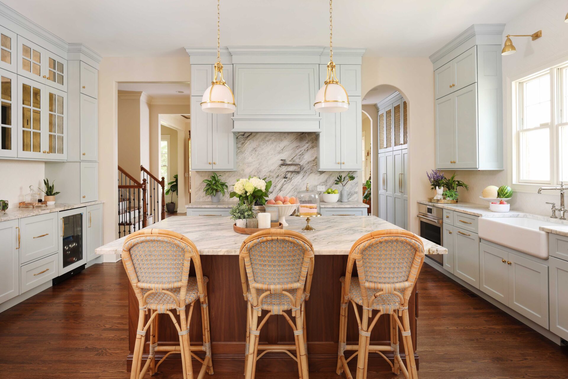 Soft blue updates the standard traditional kitchen aesthetic, keeping it fresh without resorting to a standard white kitchen palette